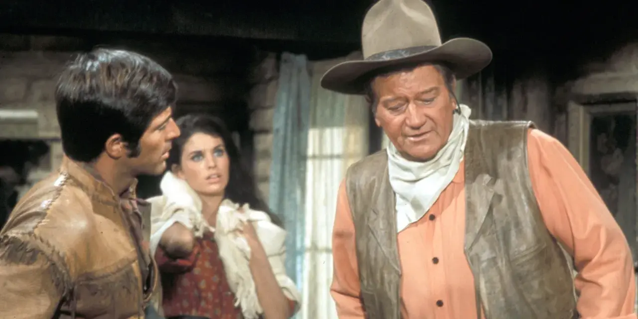 John Wayne, Rock Hudson und eine Frau im Western-Look. Die besetzung von Rio Lobo in Aktion.