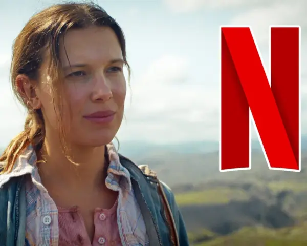 Millie Bobby Brown als Eleven im "Stranger Things"-Finale, bereit für den Kampf. Das Netflix-Logo prangt daneben.