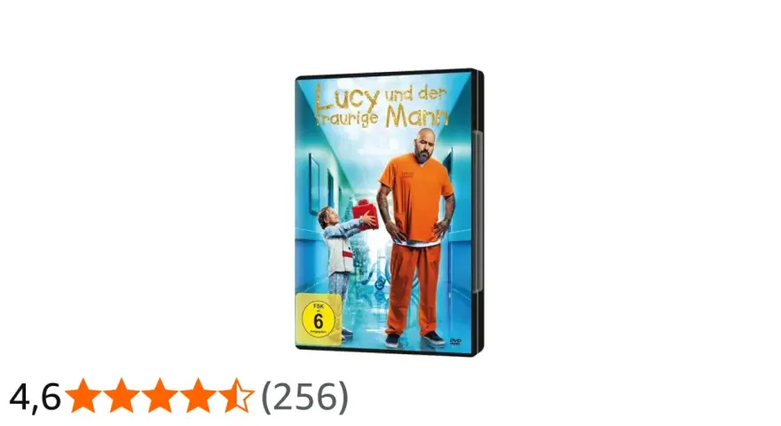 DVD-Cover "Lucy und der traurige Mann": Ein kleines Mädchen schenkt einem Mann in orangefarbener Kleidung ein Geschenk.