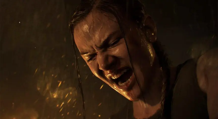 Ellie schreit vor Schmerz und Anstrengung, Schweiß und Blut auf ihrem Gesicht. Die Szene deutet auf die emotionale Intensität von "The Last of Us Staffel 3" hin.