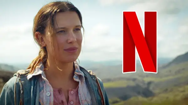 Millie Bobby Brown als Eleven im "Stranger Things"-Finale, bereit für den Kampf. Das Netflix-Logo prangt daneben.